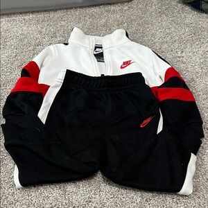 Nike Kids Black Joggers with Red and White Accents